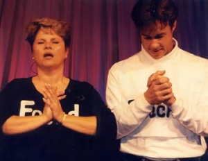 The characters "Teacher" and "Found" praying with hands folded.